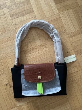 Longchamp Le Pliage large Black Tote with Brown Flap